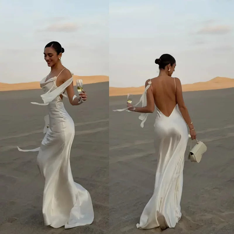 Kishai | Women’s Satin Swing Collar Maxi Dress with Flower Accent and Backless Design